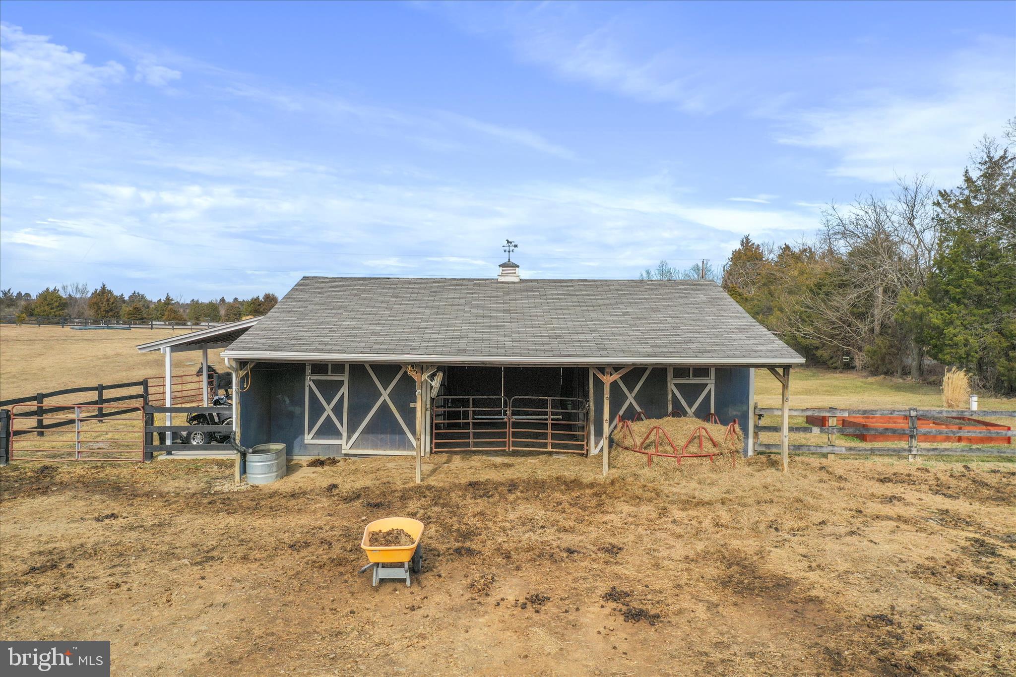5670 Long Meadow Road Middletown, VA 22645 - Photo 43 of 61 a front view of a house with a yard