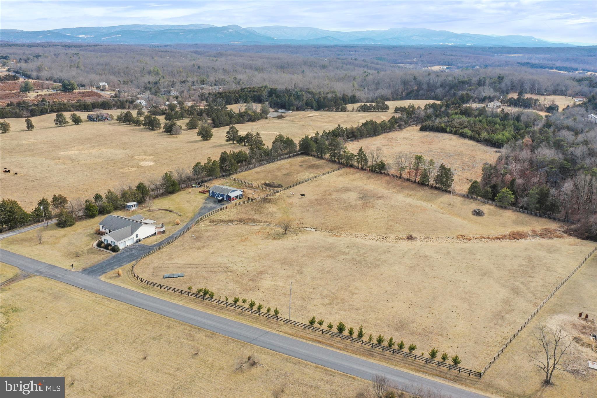 5670 Long Meadow Road Middletown, VA 22645 - Photo 47 of 61 an aerial view of residential houses with outdoor space