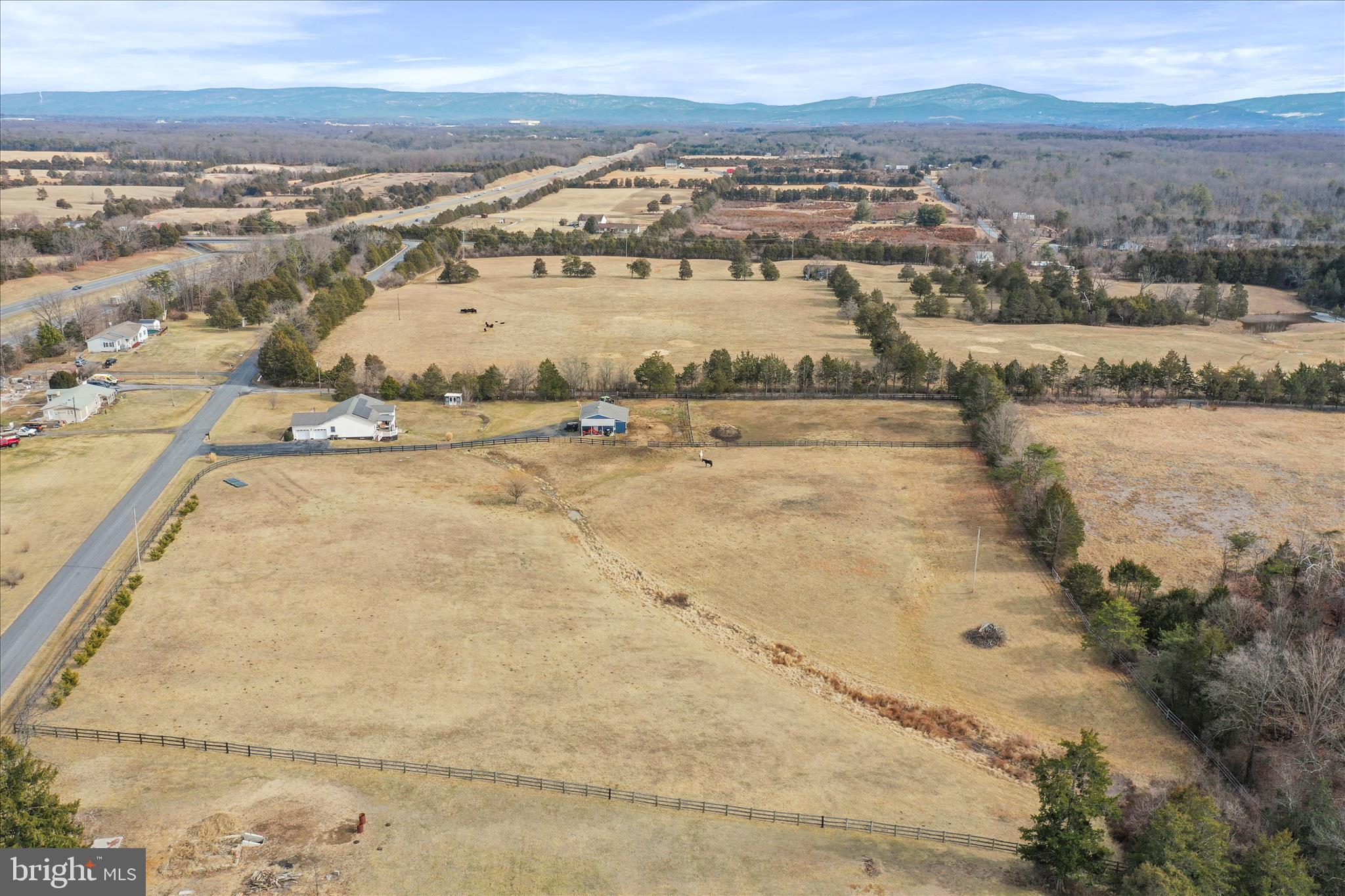 5670 Long Meadow Road Middletown, VA 22645 - Photo 48 of 61 an aerial view of residential houses with outdoor space