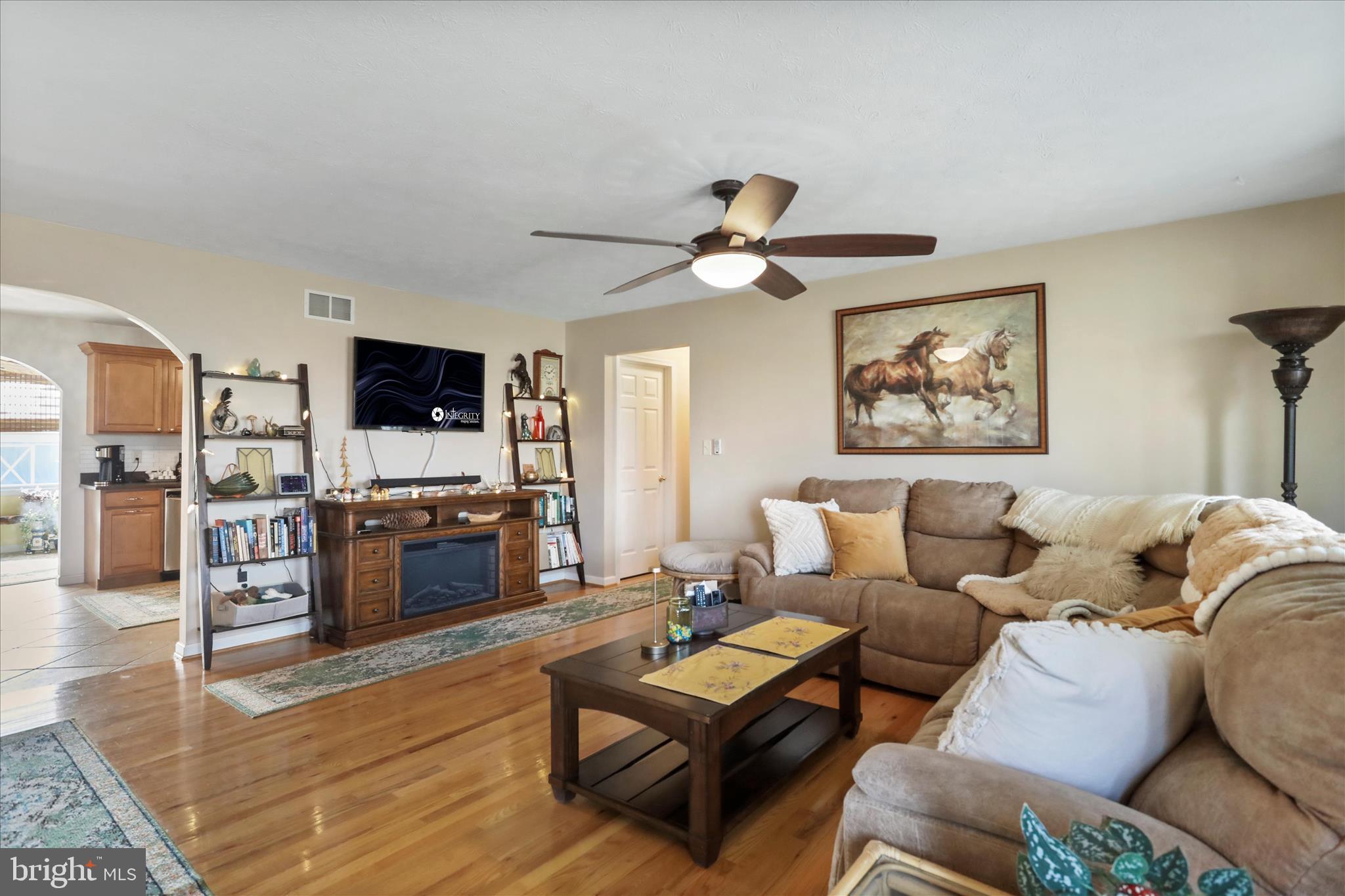 5670 Long Meadow Road Middletown, VA 22645 - Photo 5 of 61 a living room with furniture and a flat screen tv