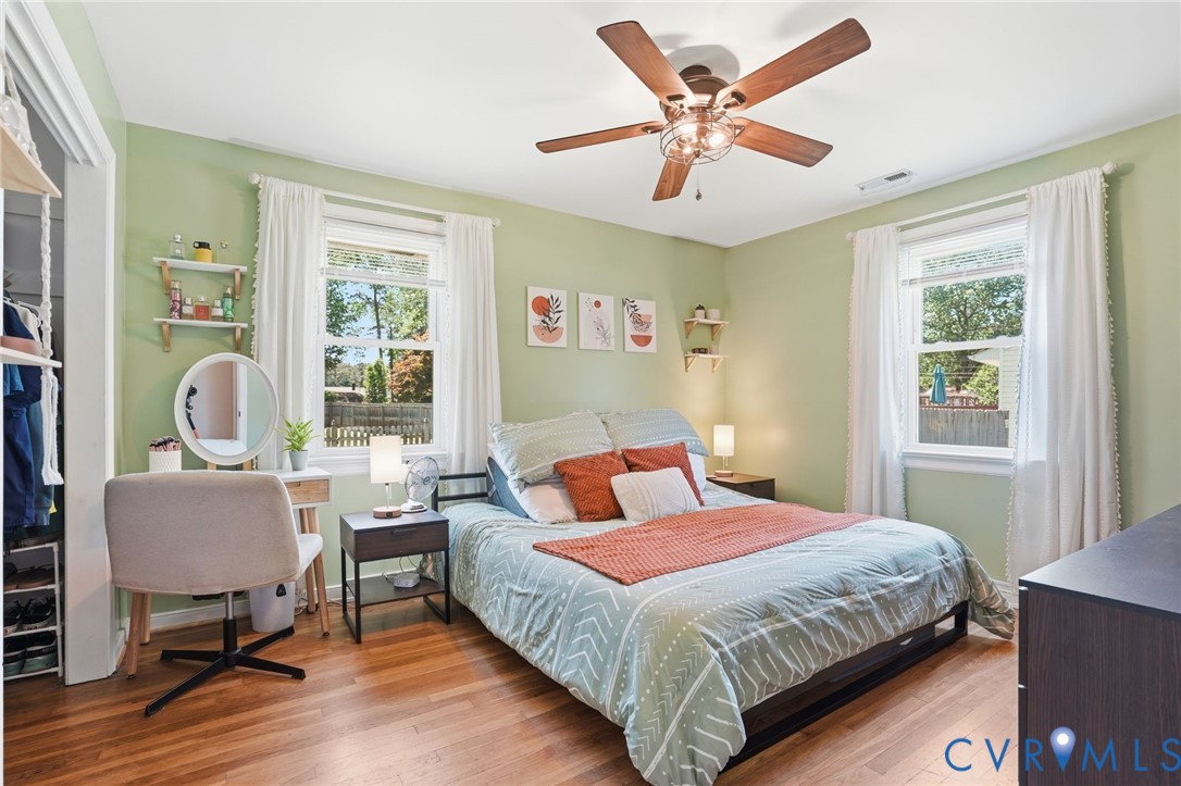 2403 Omega Road Henrico, VA 23228 - Photo 16 of 39 a bedroom with a bed a table and chair