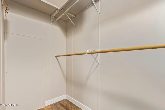 a view of small space with racks on the wall