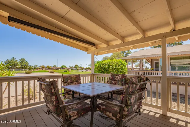 a view of balcony with furniture