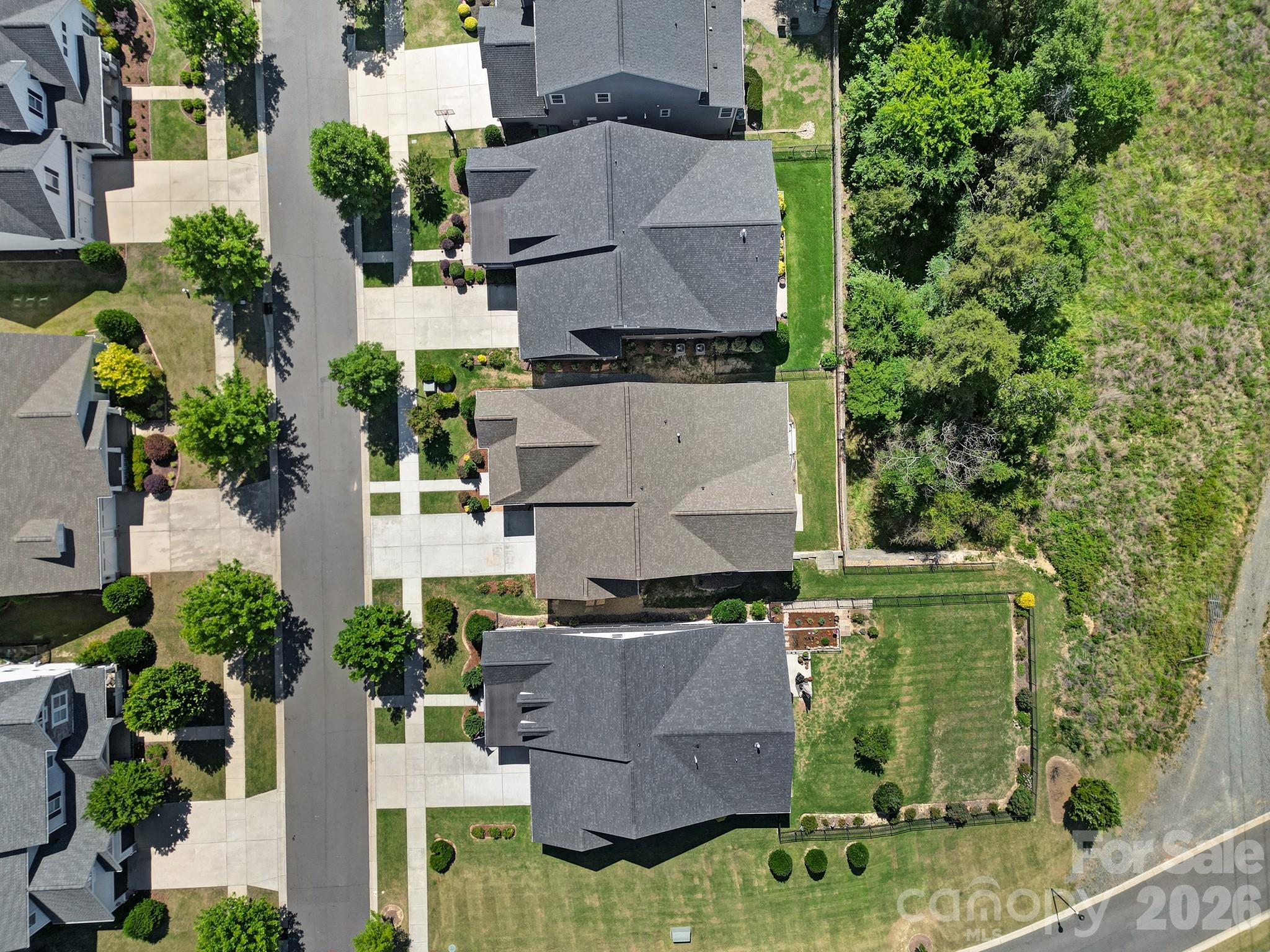 1633 Half Pint Loop Fort Mill, SC 29708 - Photo 33 of 48 an aerial view of multiple houses with outdoor space