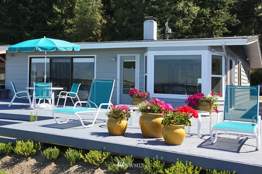 6316 South Bay Road Freeland, WA 98249 - Photo 2 of 15 a view of a house with outdoor seating space