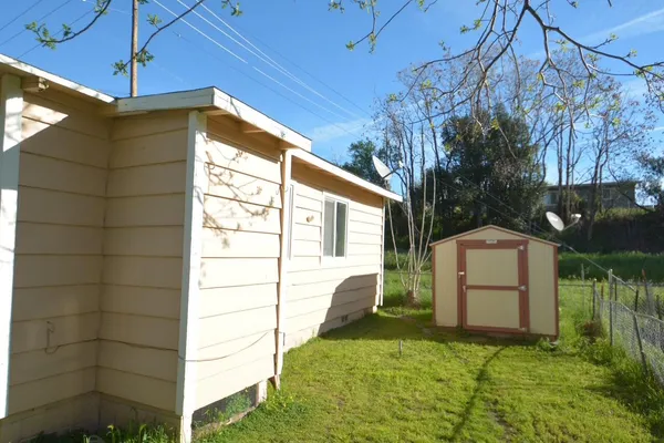 a house view with a outdoor space