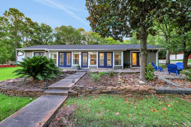 front view of a house with a yard