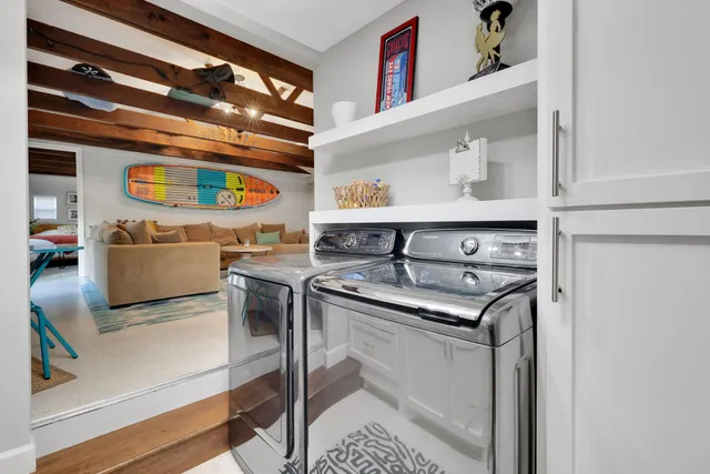 a kitchen with stainless steel appliances granite countertop a stove and a sink