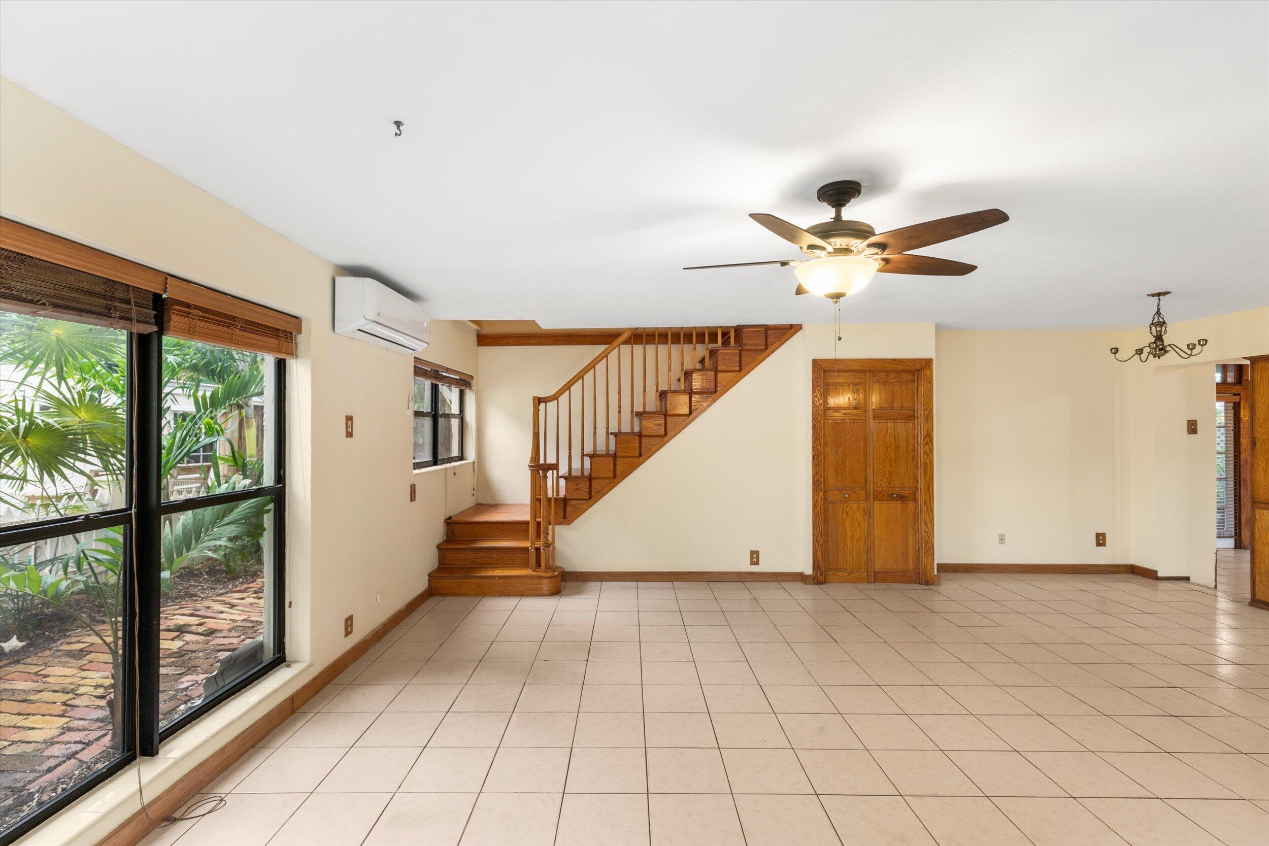 2914 Fogarty Avenue Key West, FL 33040 - Photo 12 of 44 wooden floor in an empty room with a window