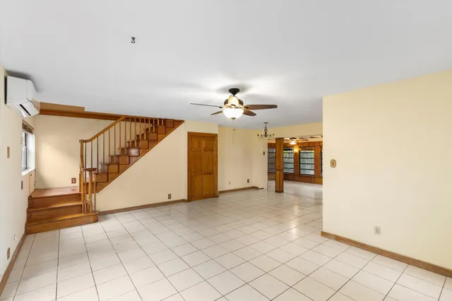 a view of a livingroom with a staircase