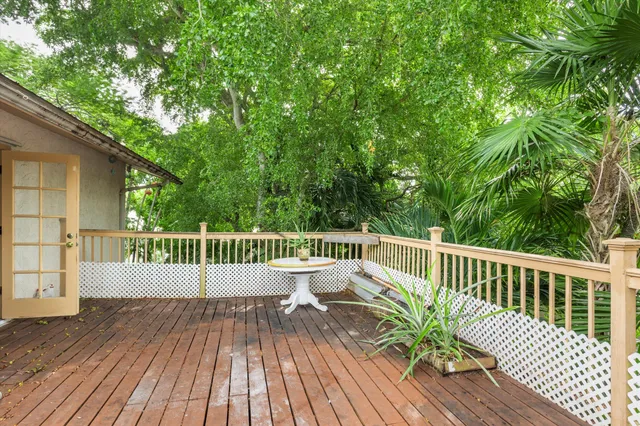 a view of balcony with wooden floor and outdoor space
