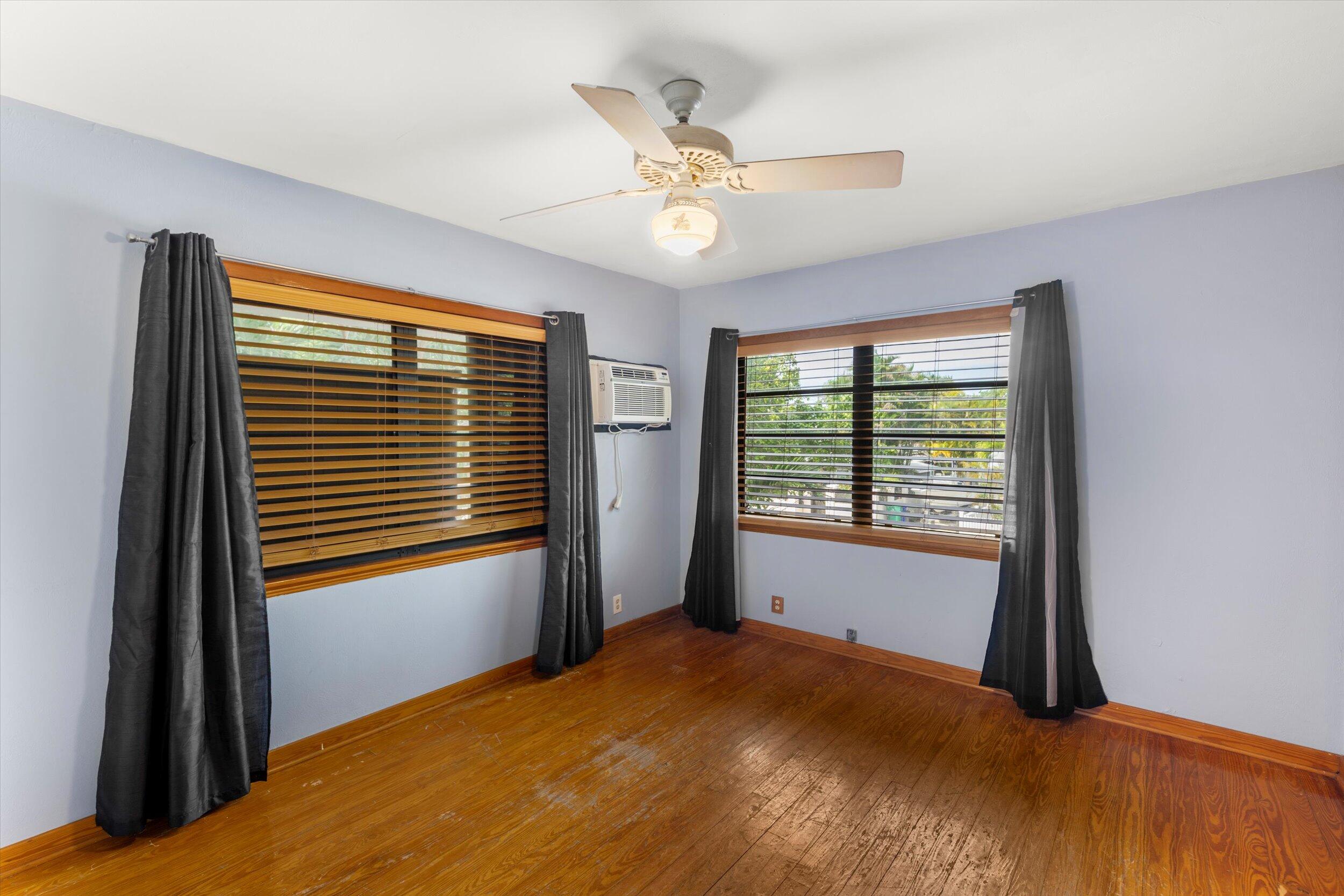 2914 Fogarty Avenue Key West, FL 33040 - Photo 26 of 44 a bedroom with a bed and a window