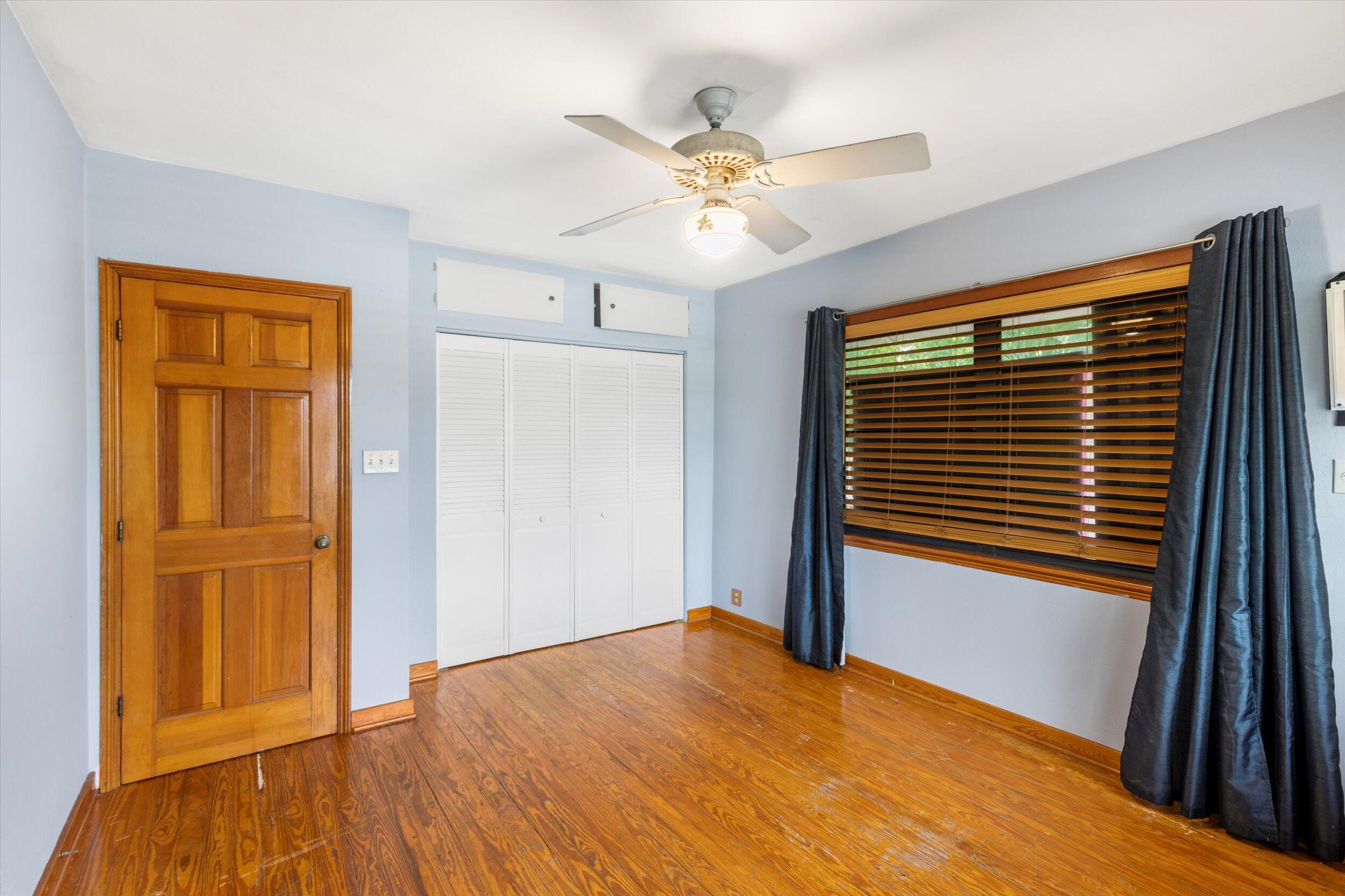 2914 Fogarty Avenue Key West, FL 33040 - Photo 27 of 44 a view of an empty room with wooden floor and a window