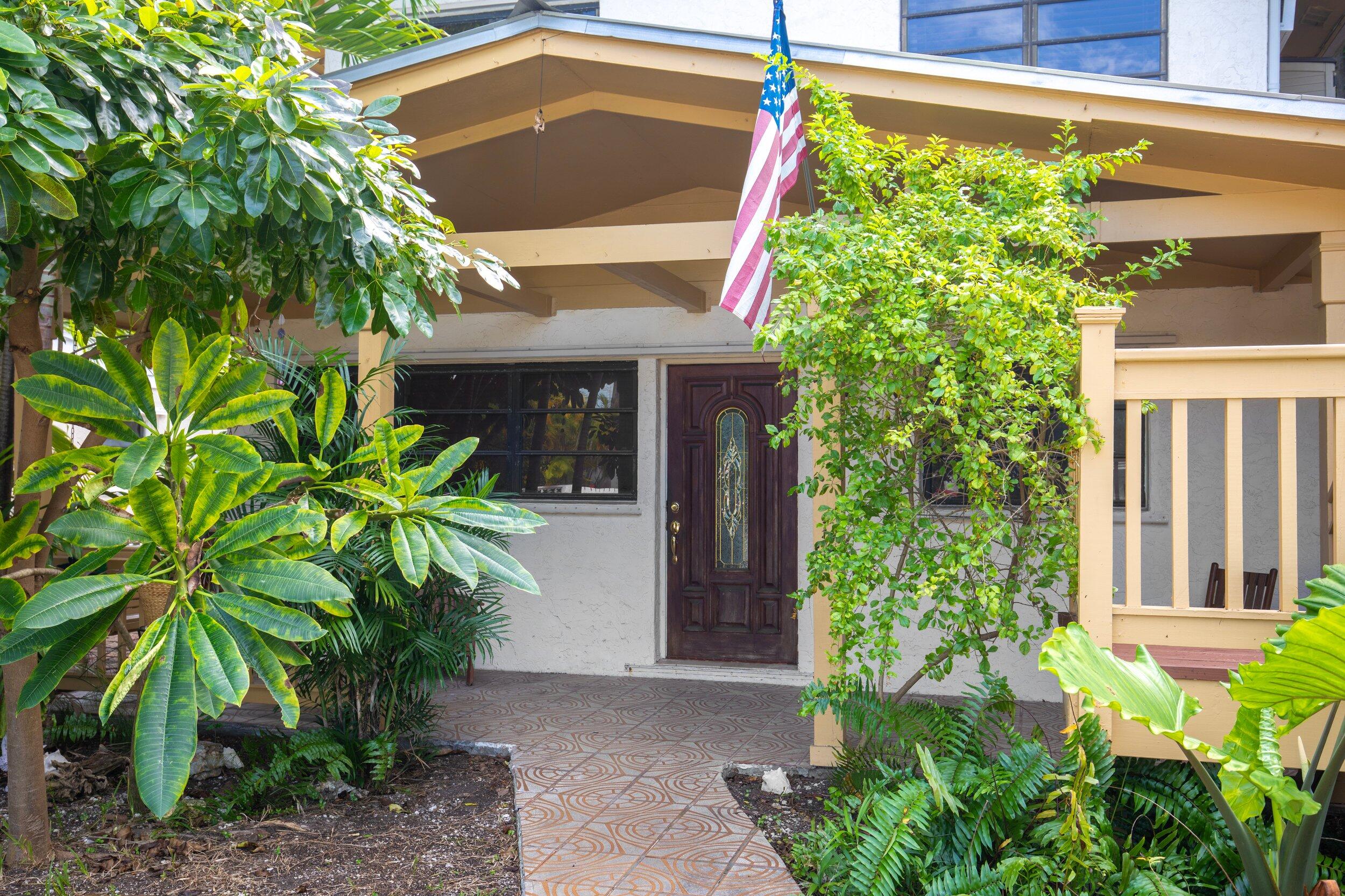 2914 Fogarty Avenue Key West, FL 33040 - Photo 3 of 44 a front view of a house with a yard