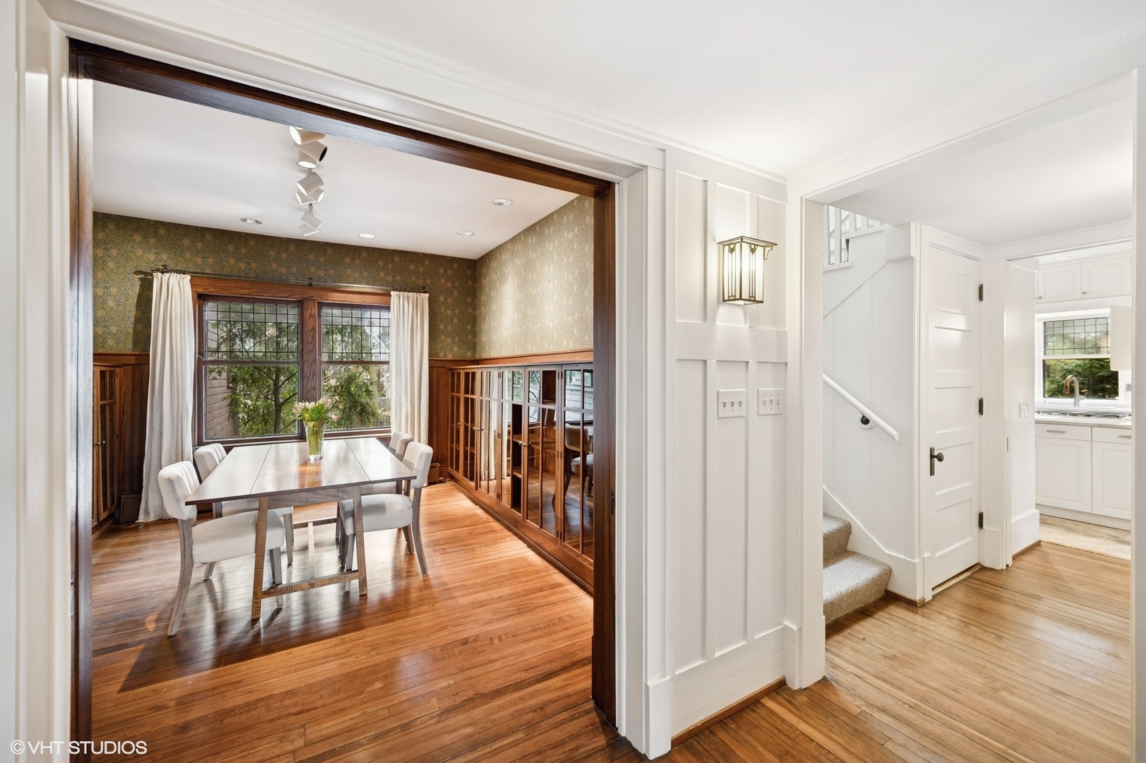 822 Bryant Avenue Winnetka, IL 60093 - Photo 11 of 37 a dining room with wooden floor and a window
