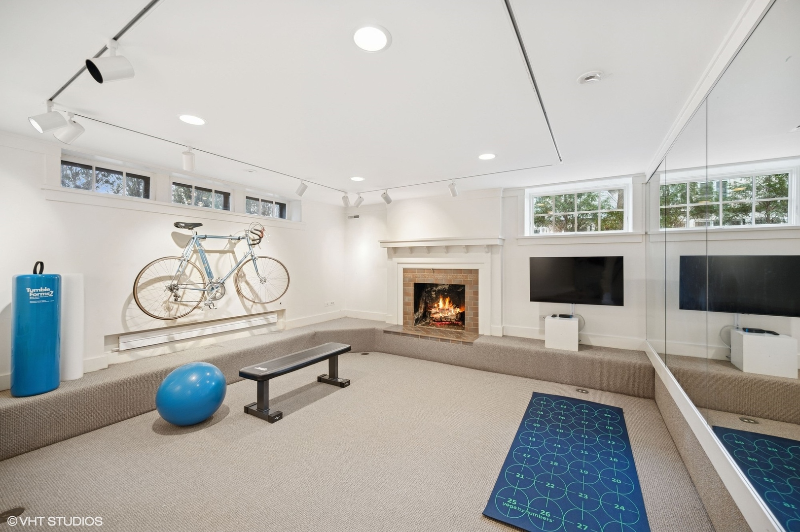 822 Bryant Avenue Winnetka, IL 60093 - Photo 19 of 37 a living room with furniture and a fireplace