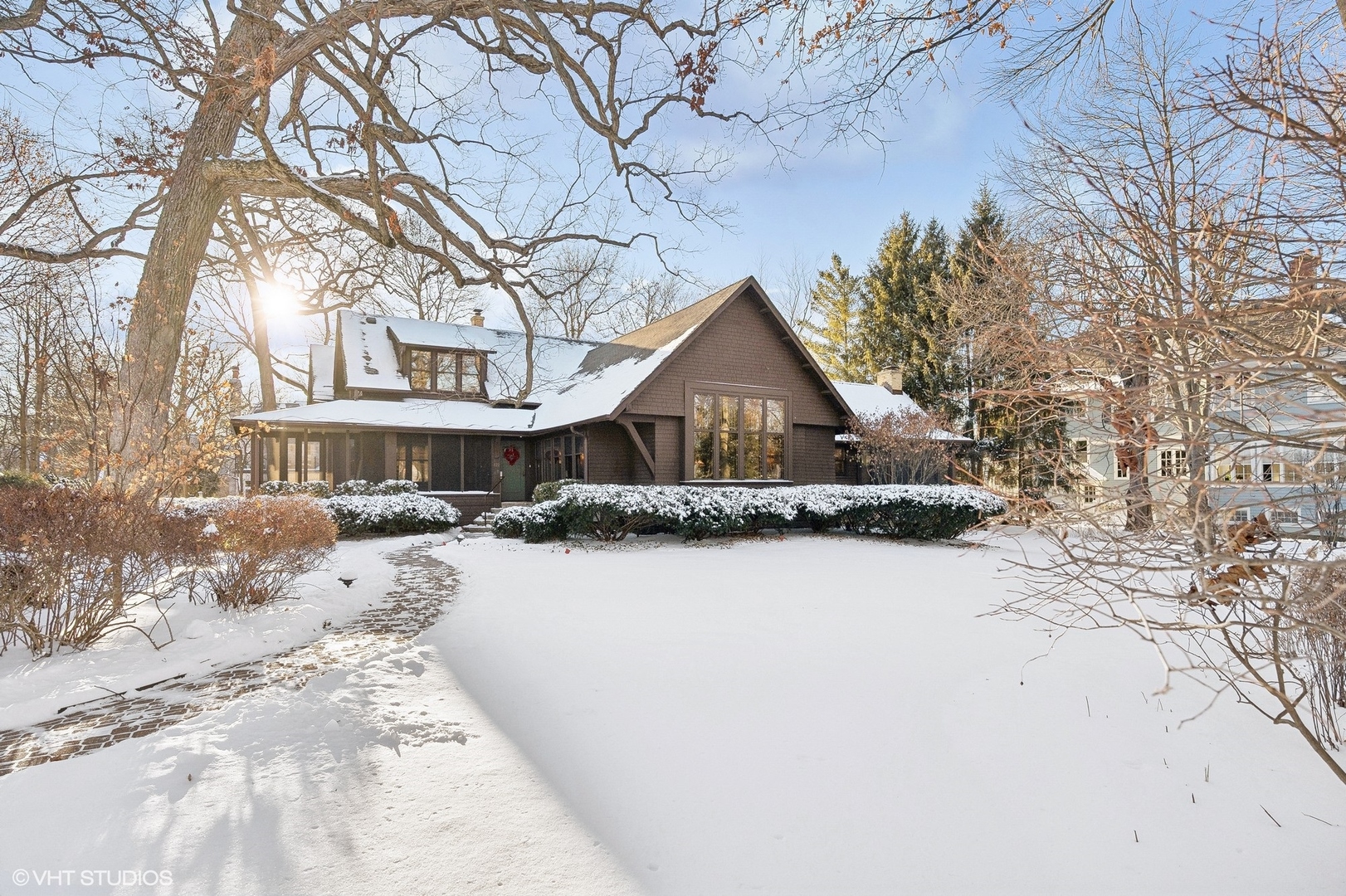 822 Bryant Avenue Winnetka, IL 60093 - Photo 31 of 37 a front view of house with yard covered in snow