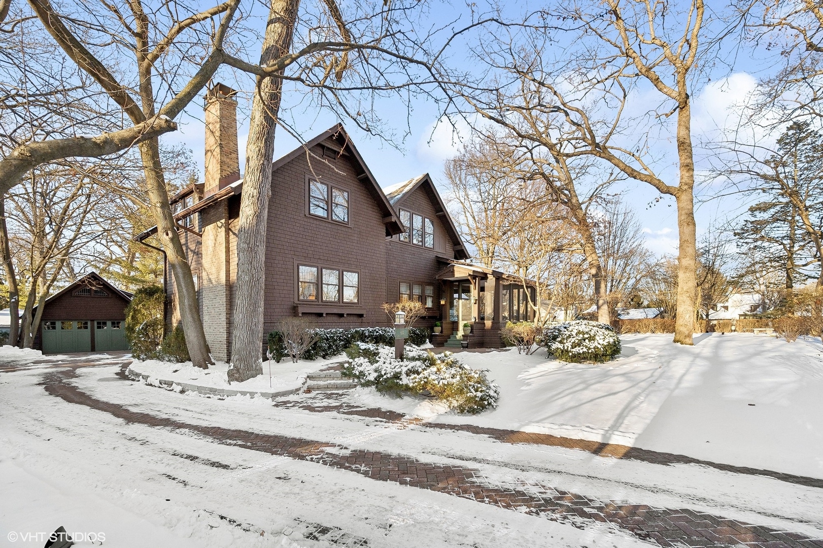 822 Bryant Avenue Winnetka, IL 60093 - Photo 33 of 37 a view of a house with snow on the road