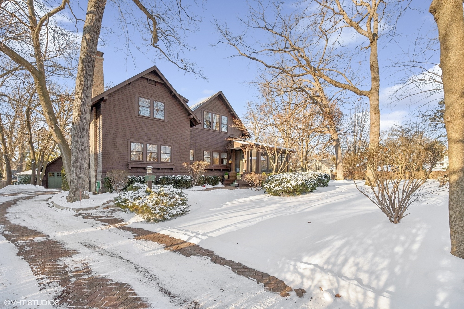 822 Bryant Avenue Winnetka, IL 60093 - Photo 34 of 37 a view of a house with snow on the road