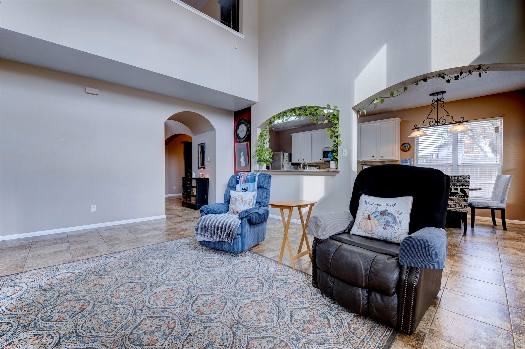 9214 Windy Spring Court Houston, TX 77089 - Photo 12 of 50 a living room with furniture and a large window