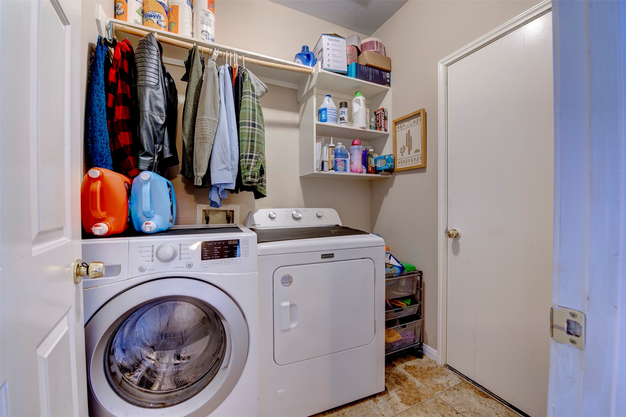 9214 Windy Spring Court Houston, TX 77089 - Photo 27 of 50 a utility room with dryer and washer