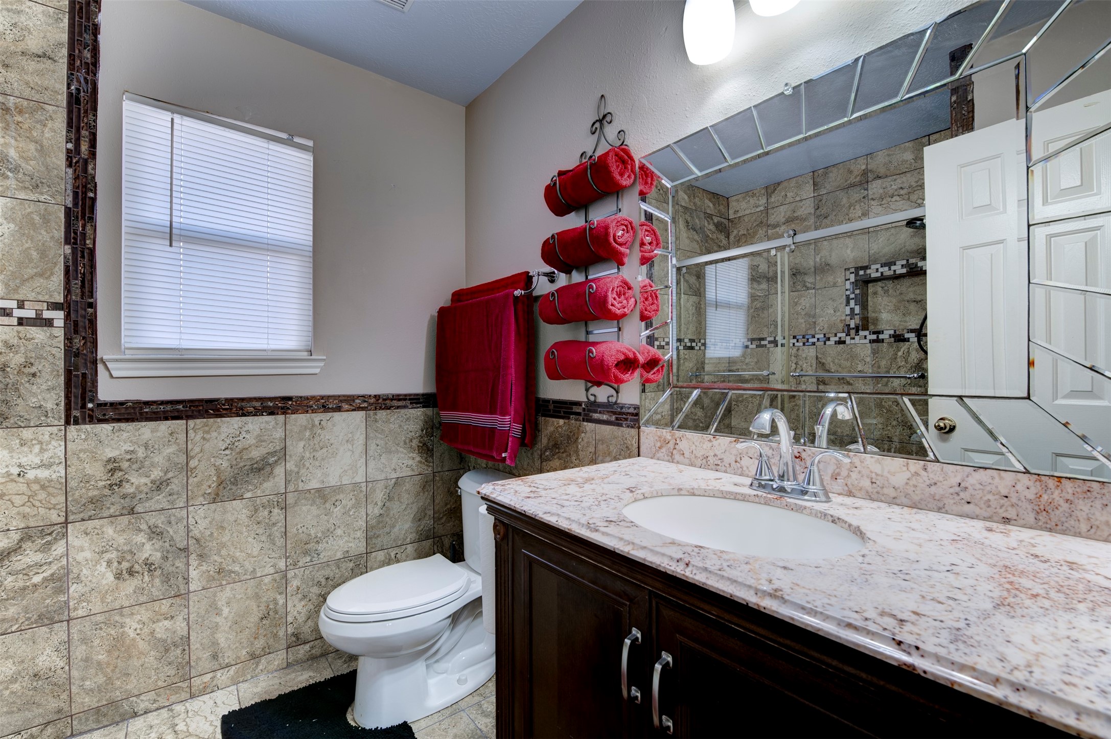 9214 Windy Spring Court Houston, TX 77089 - Photo 30 of 50 a bathroom with a sink toilet and shower