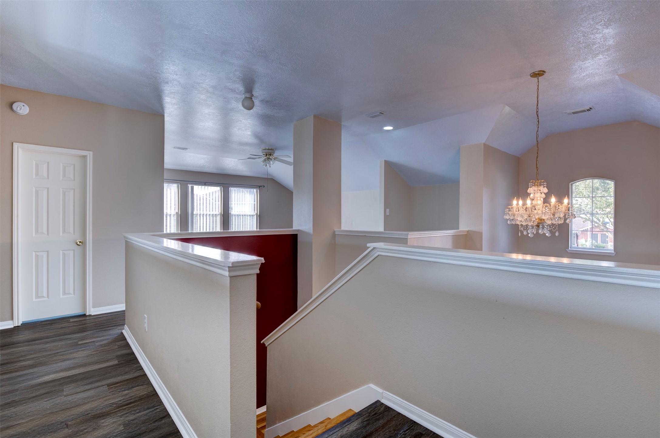 9214 Windy Spring Court Houston, TX 77089 - Photo 34 of 50 a view of entryway and hall with wooden floor