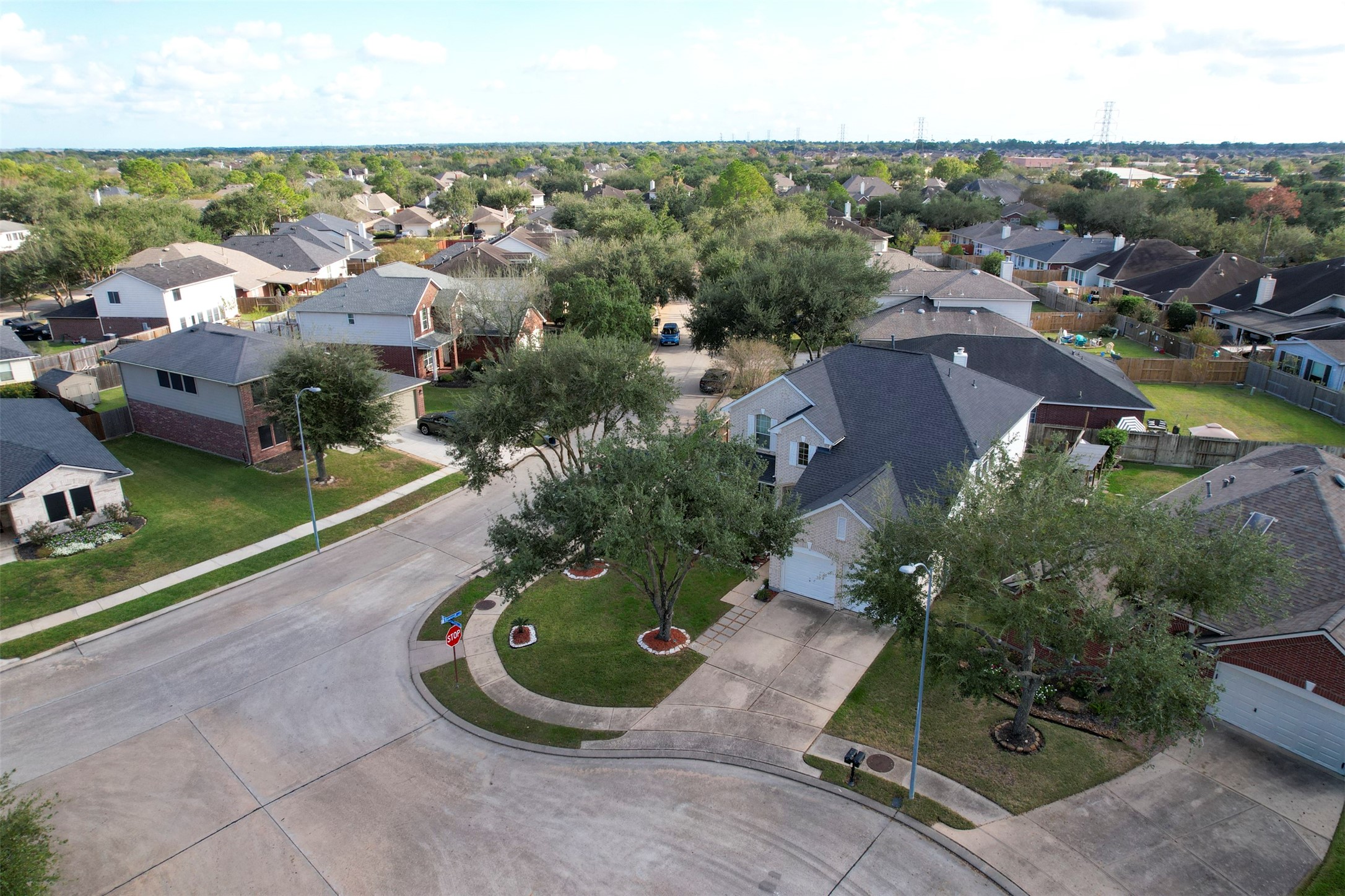 9214 Windy Spring Court Houston, TX 77089 - Photo 42 of 50 an aerial view of a house with a yard and lake view