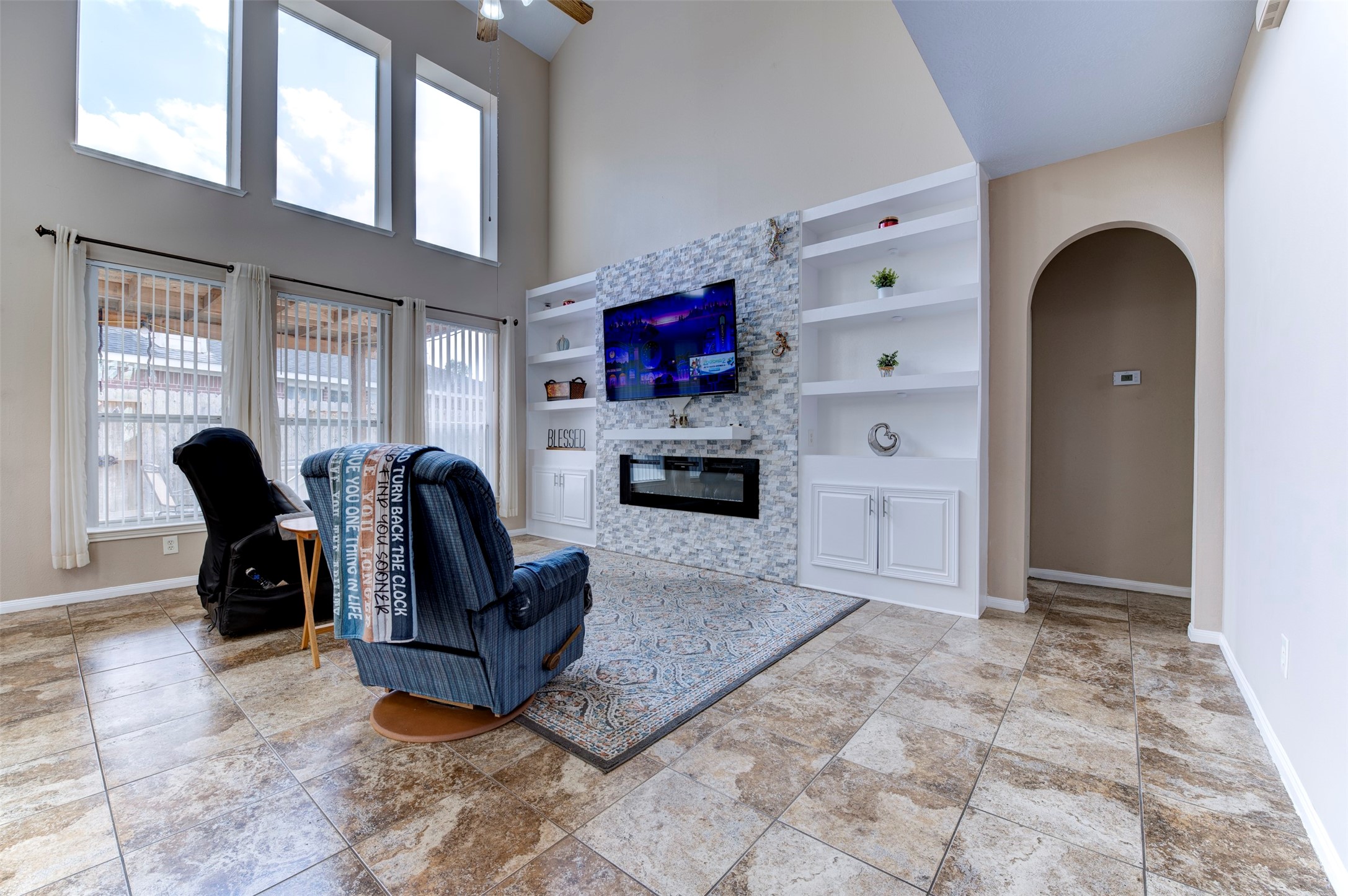 9214 Windy Spring Court Houston, TX 77089 - Photo 7 of 50 a living room with furniture and a flat screen tv