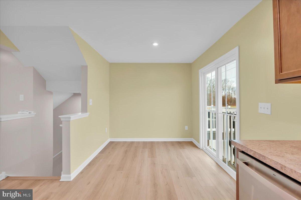 317 Comfort Road Williamstown, NJ 08094 - Photo 11 of 20 a view of a hallway with wooden floor and entryway