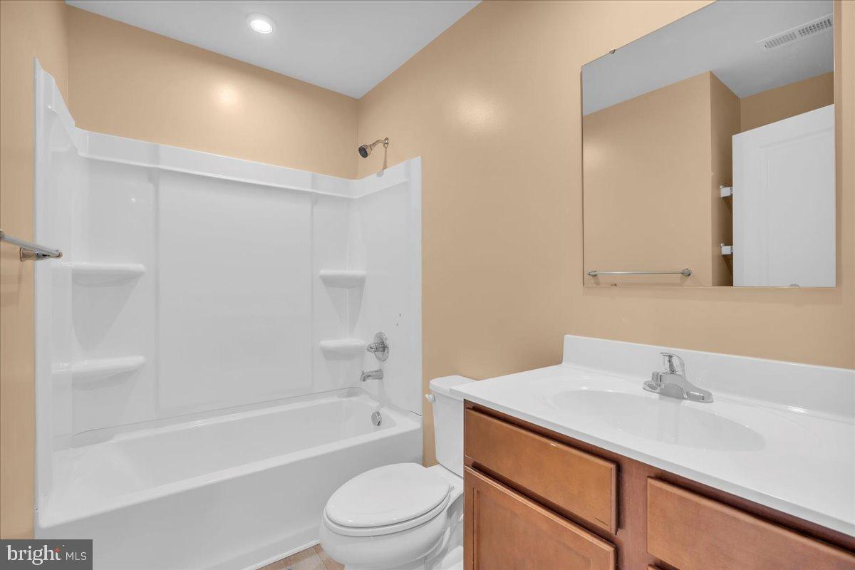 317 Comfort Road Williamstown, NJ 08094 - Photo 13 of 20 a bathroom with a sink a toilet and shower
