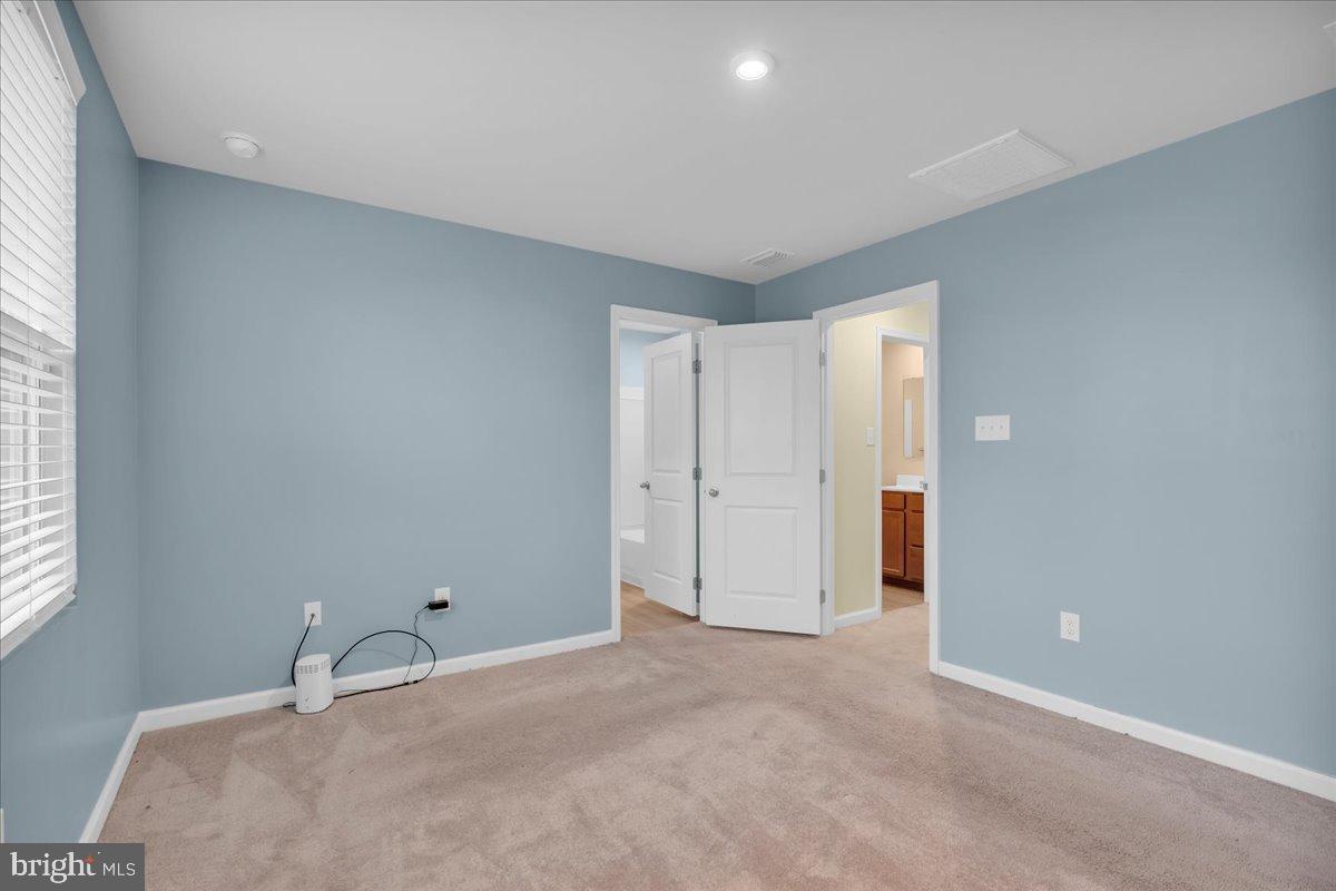 317 Comfort Road Williamstown, NJ 08094 - Photo 15 of 20 a room with a bed and a window