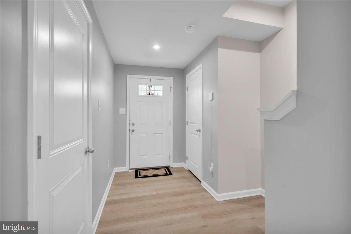 317 Comfort Road Williamstown, NJ 08094 - Photo 3 of 20 a view of a hallway with wooden floor
