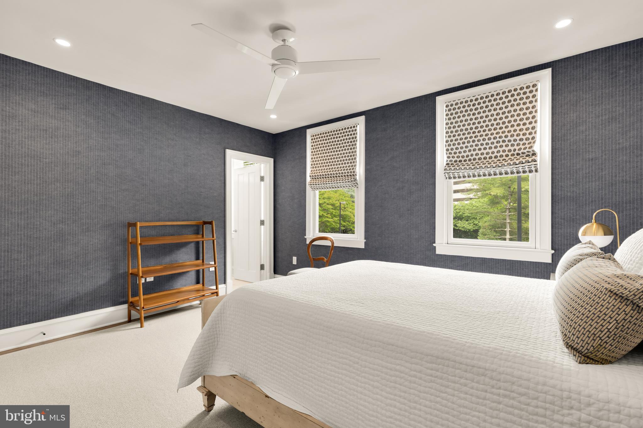 7449 Arlington Road Bethesda, MD 20814 - Photo 31 of 35 a bedroom with a bed and a window