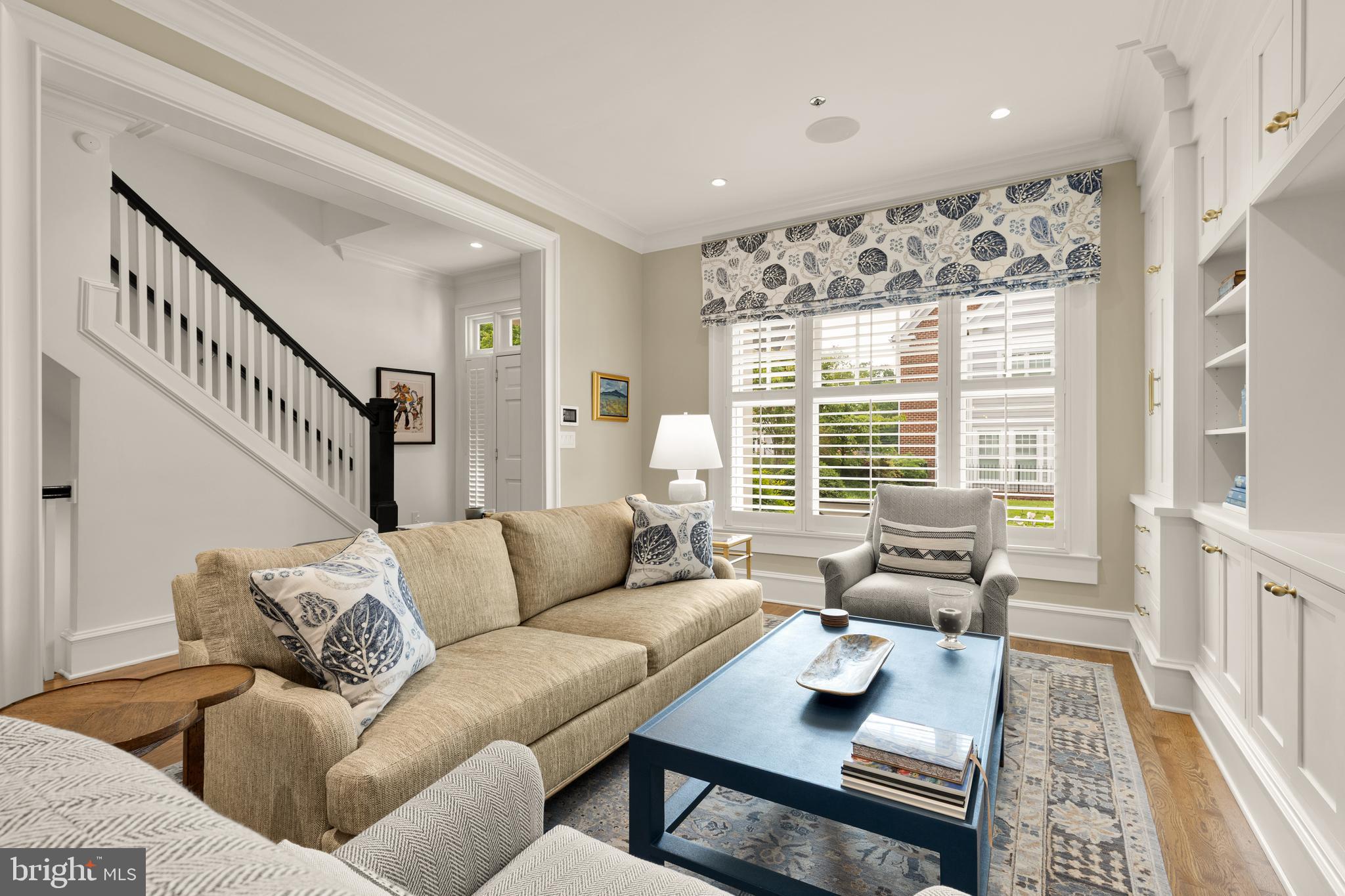 7449 Arlington Road Bethesda, MD 20814 - Photo 5 of 35 a living room with furniture and a large window