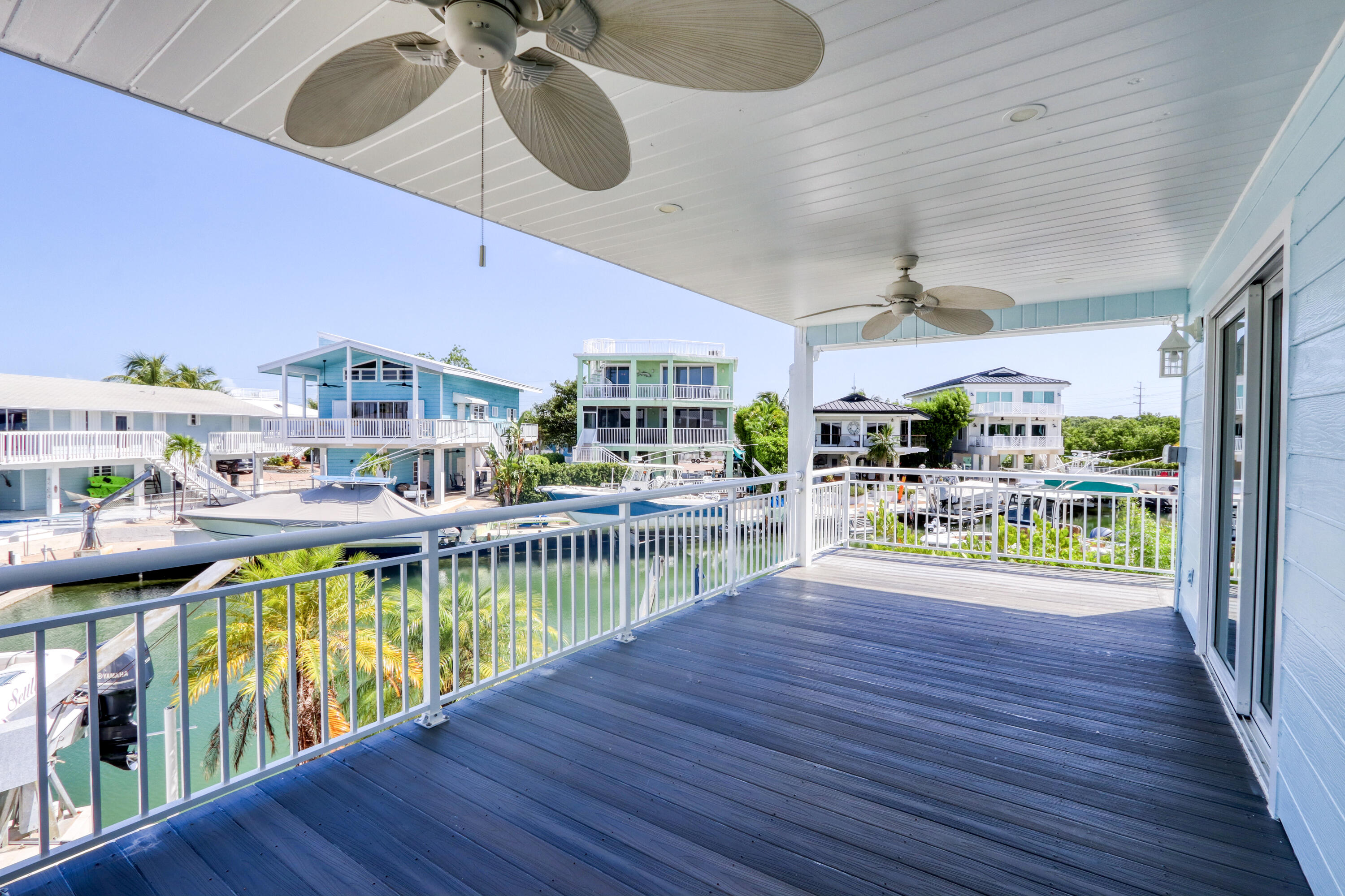 214 Aberdeen Court Tavernier, FL 33070 - Photo 18 of 81 a view of a swimming pool and outdoor space