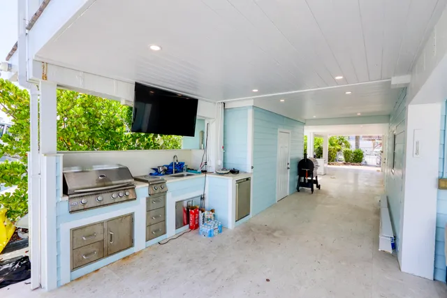 a kitchen with a stove and a microwave