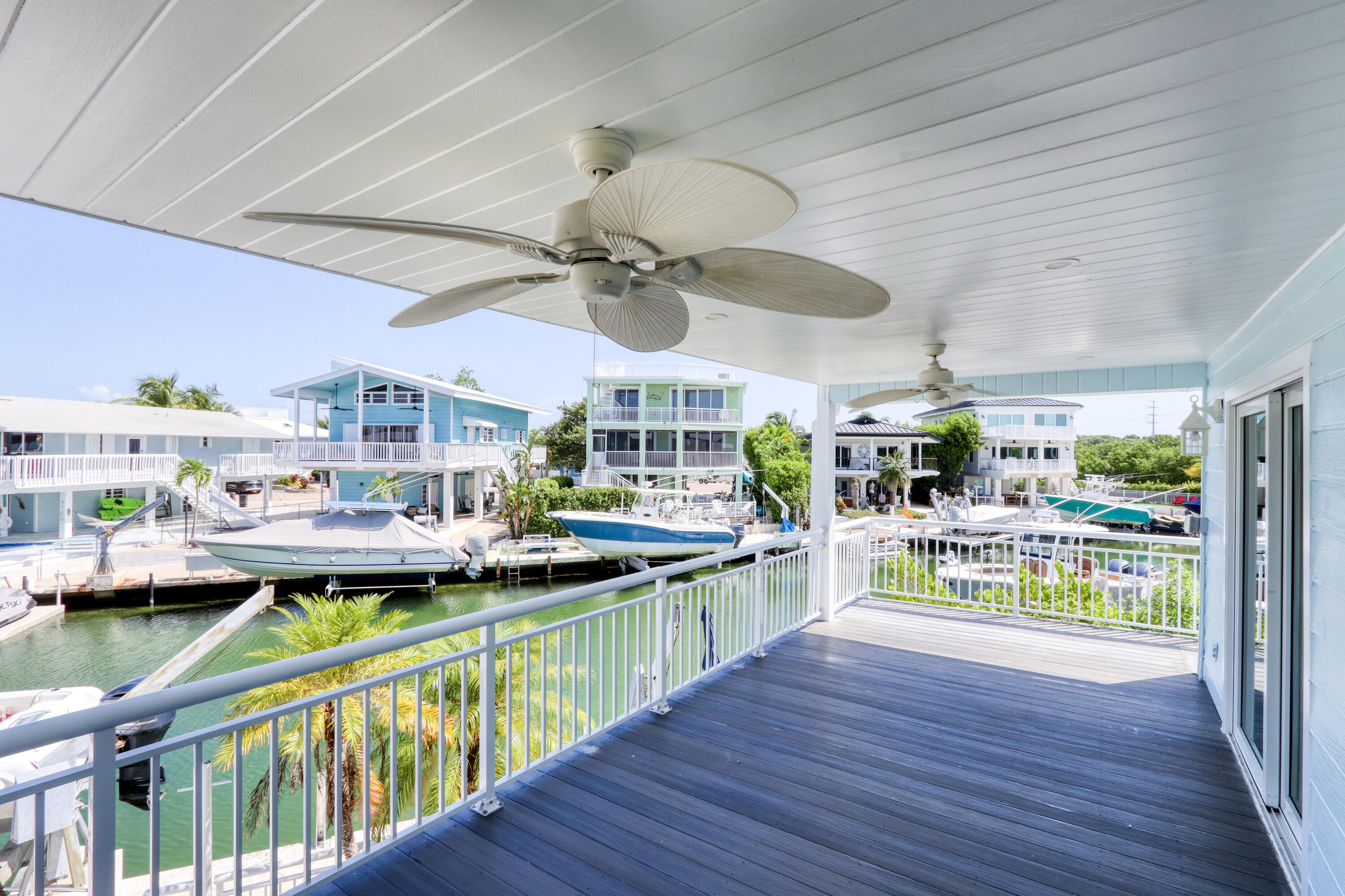 214 Aberdeen Court Tavernier, FL 33070 - Photo 37 of 81 a view of a swimming pool and outdoor seating