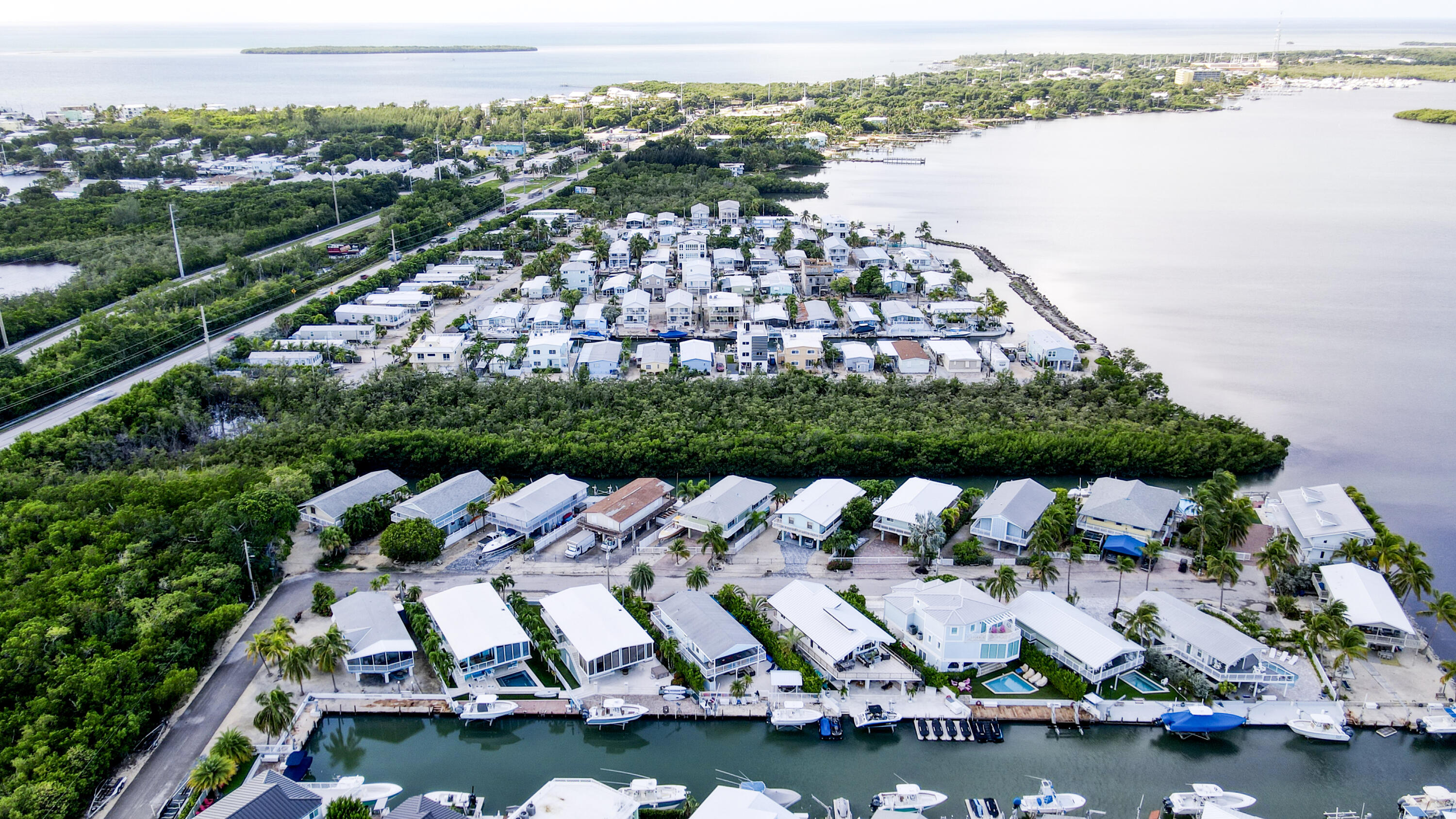214 Aberdeen Court Tavernier, FL 33070 - Photo 5 of 81 an aerial view of residential houses with outdoor space and lake view