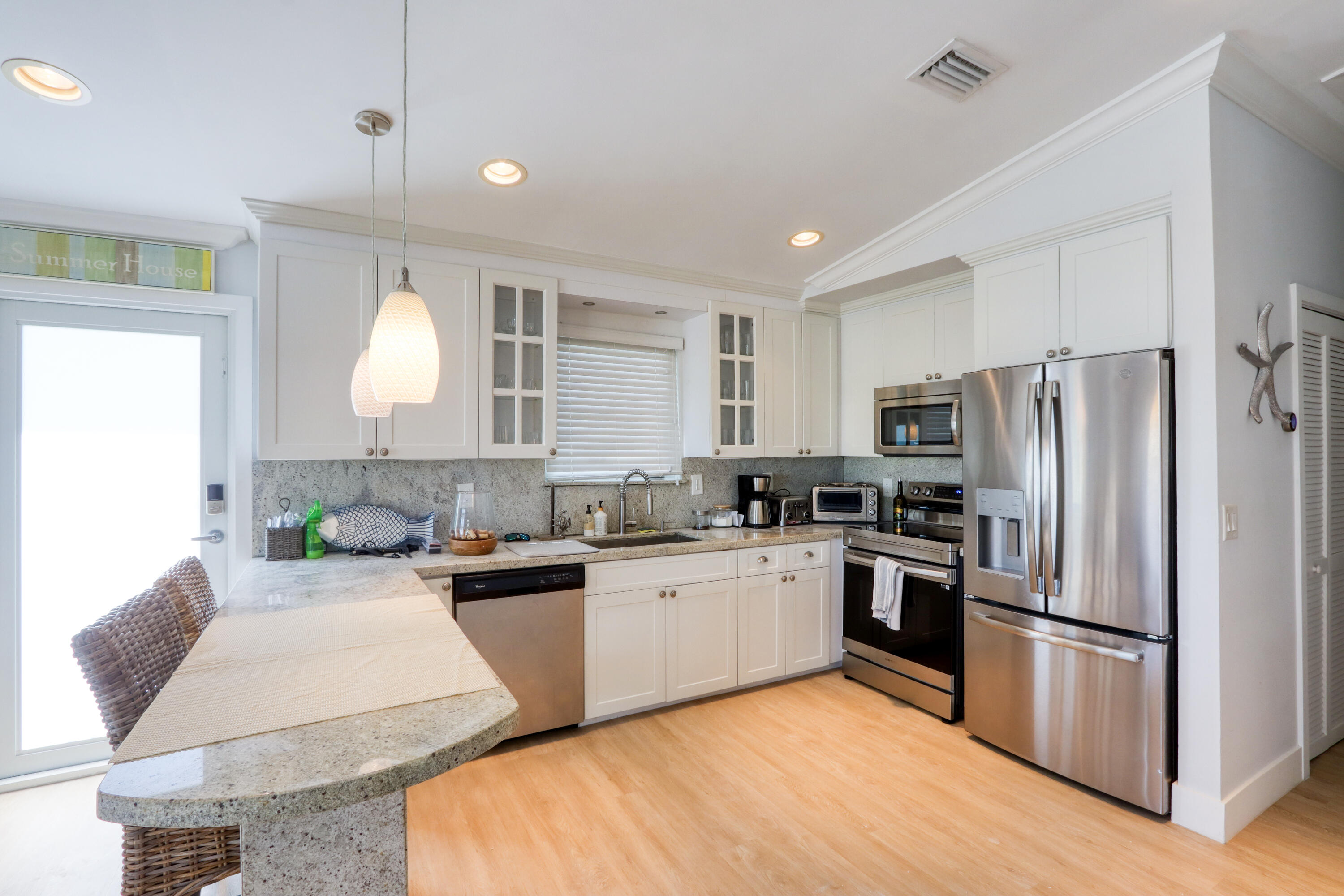 214 Aberdeen Court Tavernier, FL 33070 - Photo 53 of 81 a kitchen with granite countertop a sink stainless steel appliances and cabinets