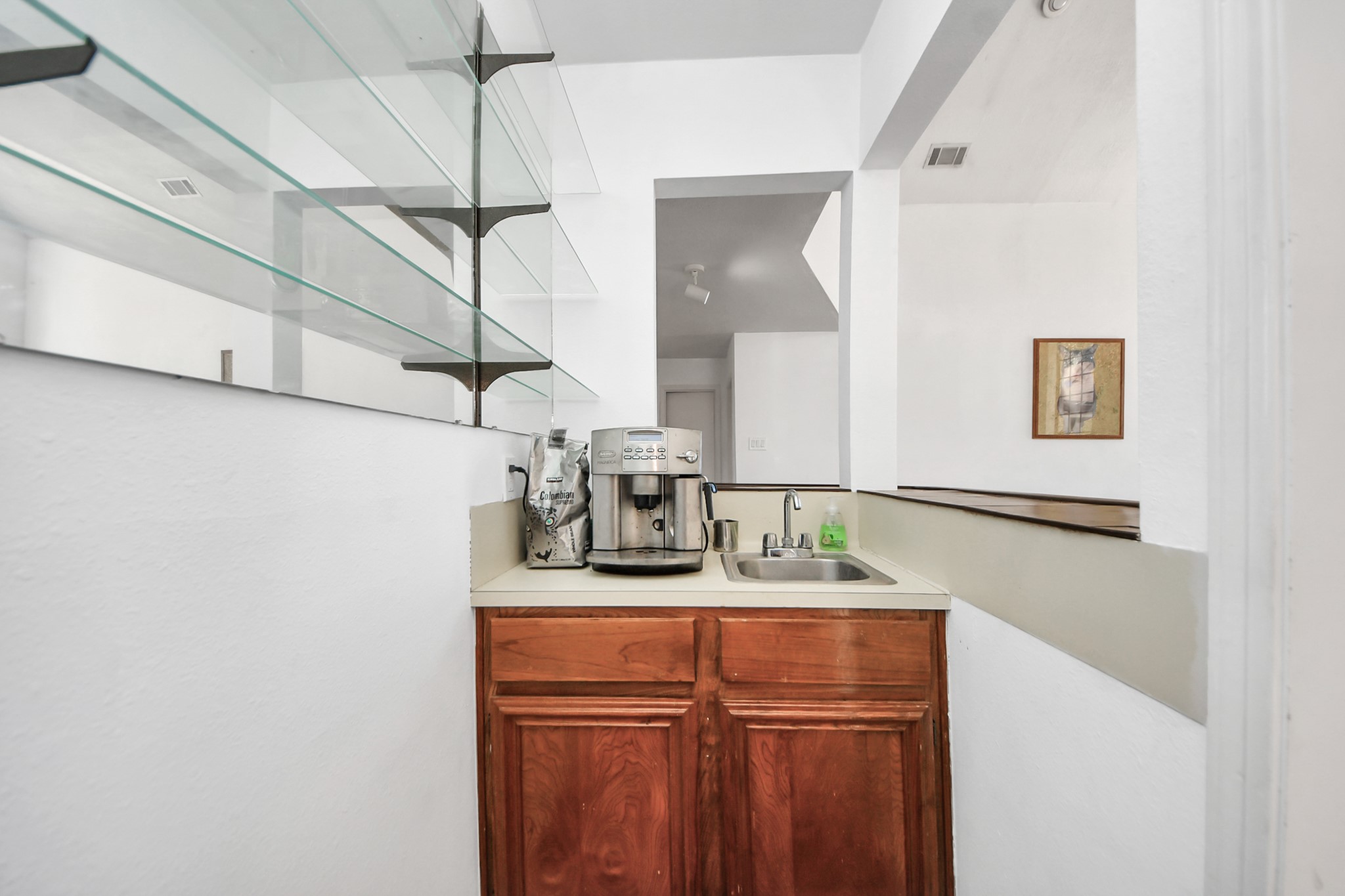 4712 Country Club View Baytown, TX 77521 - Photo 17 of 50 a kitchen with a sink cabinets and appliances