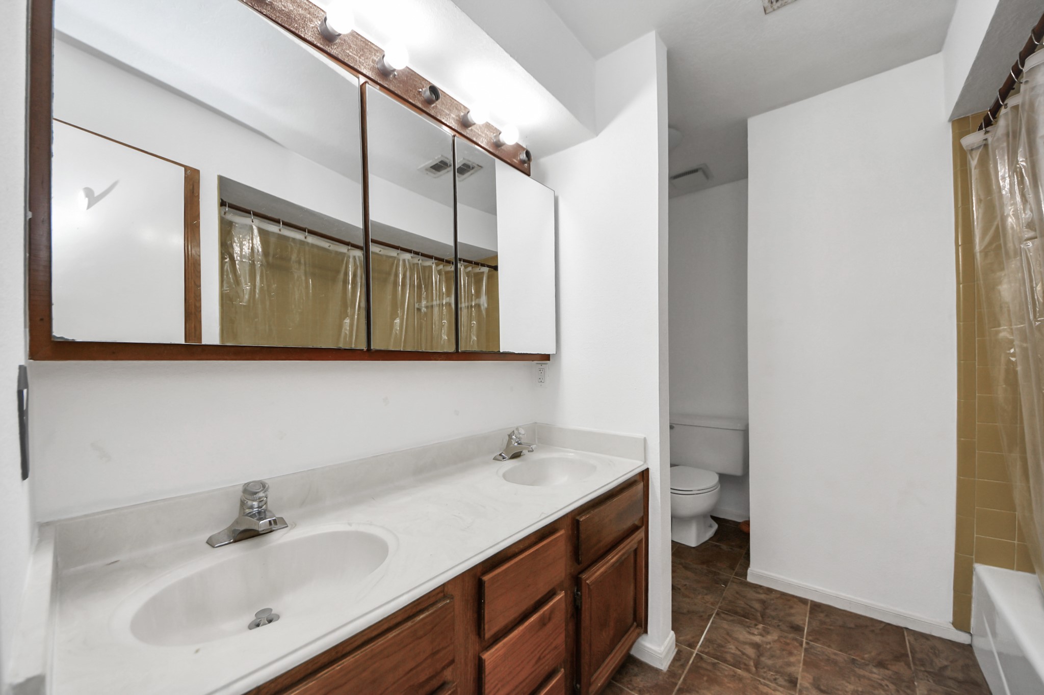 4712 Country Club View Baytown, TX 77521 - Photo 37 of 50 a bathroom with a sink and a mirror