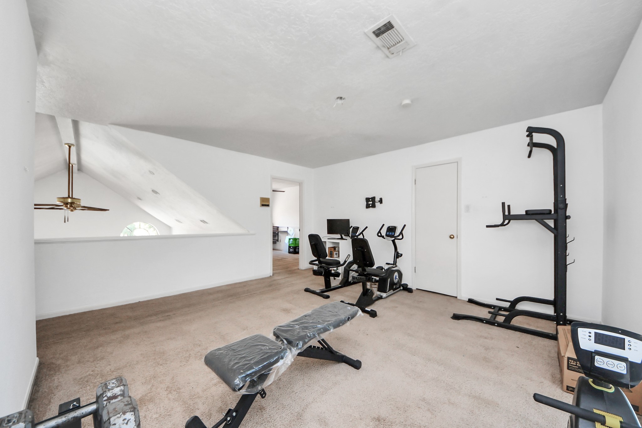 4712 Country Club View Baytown, TX 77521 - Photo 39 of 50 a view of a room with gym equipment