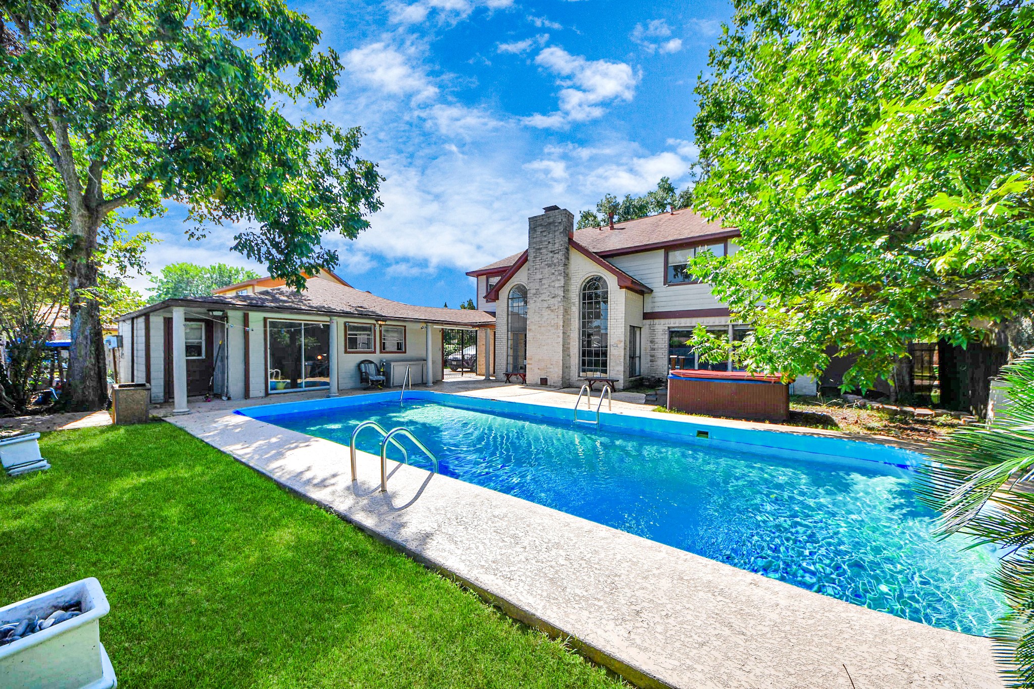 4712 Country Club View Baytown, TX 77521 - Photo 47 of 50 a view of house with outdoor space and swimming pool