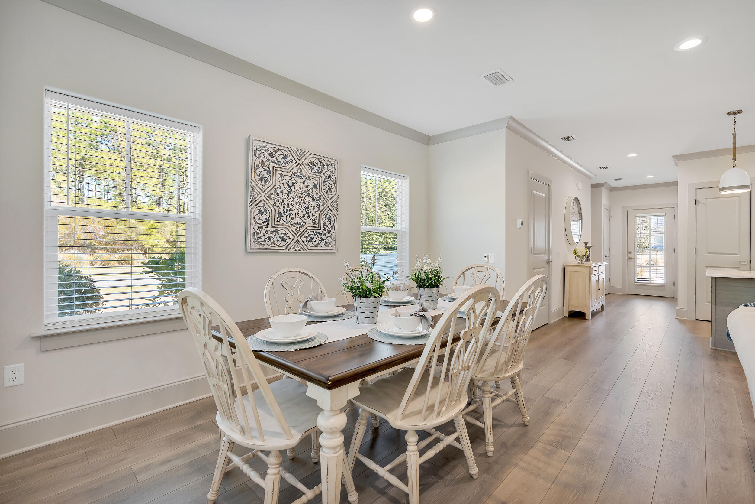 95 Golden Bell Ct Inlet Beach, Unit 95C Inlet Beach, FL 32461 - Photo 17 of 47 a view of a dining room with furniture and wooden floor