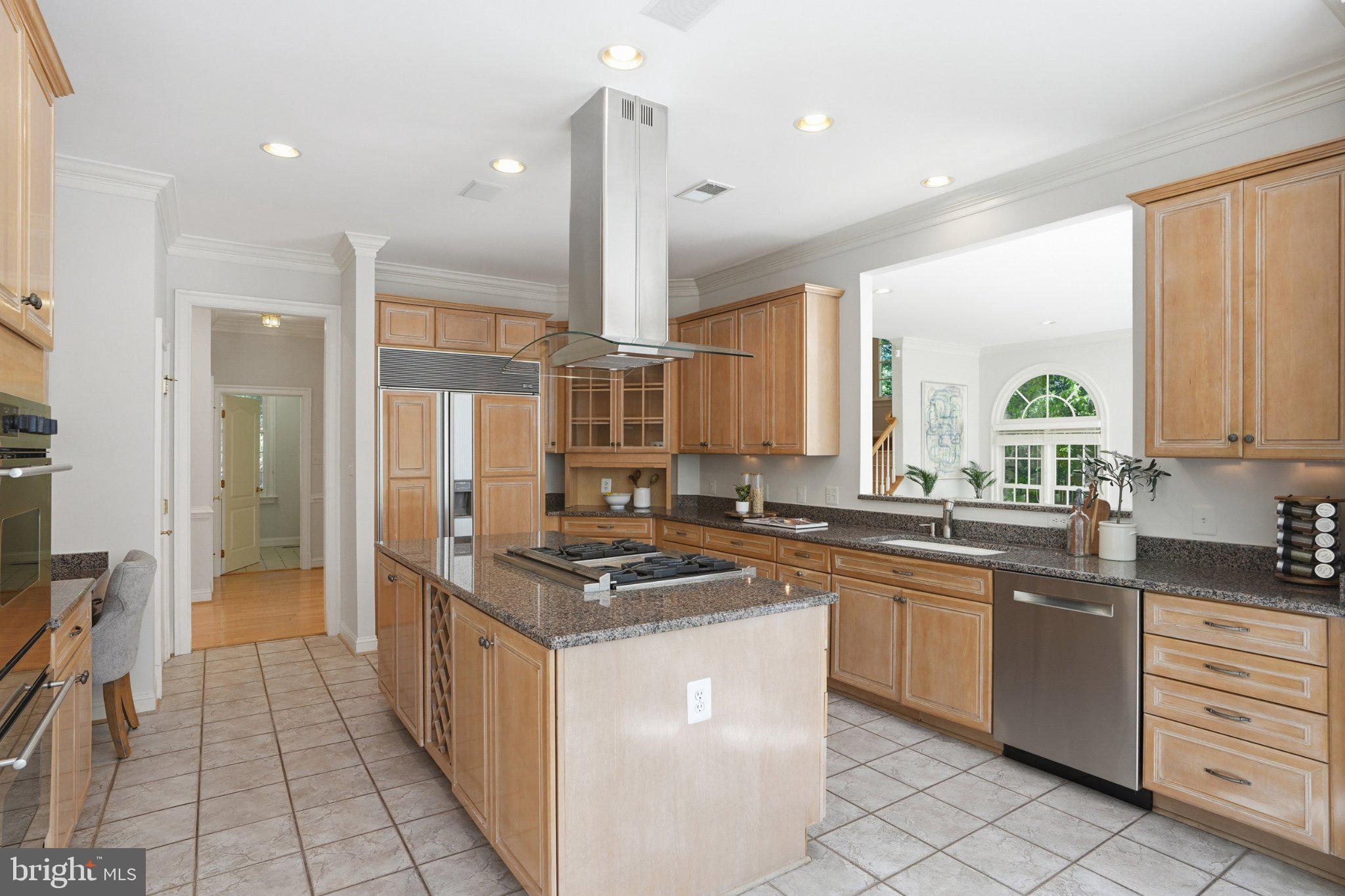 891 Chinquapin Road McLean, VA 22102 - Photo 28 of 78 Modern kitchen with warm wood tones.