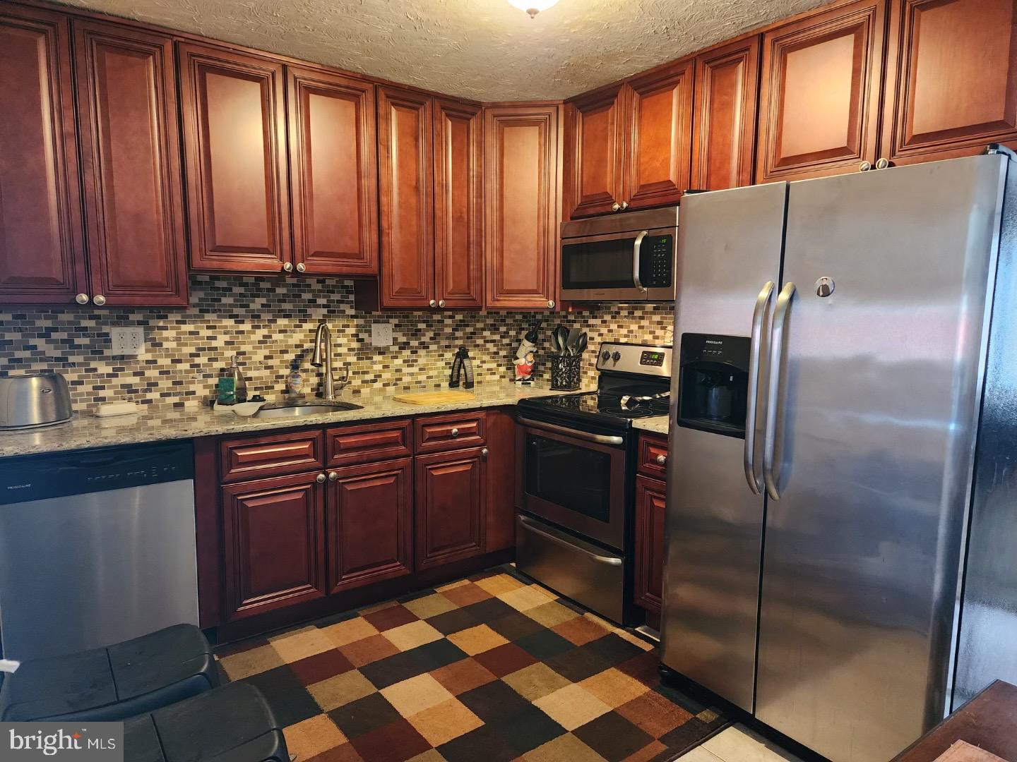 18 Middle Road Levittown, PA 19056 - Photo 15 of 33 Newer kitchen