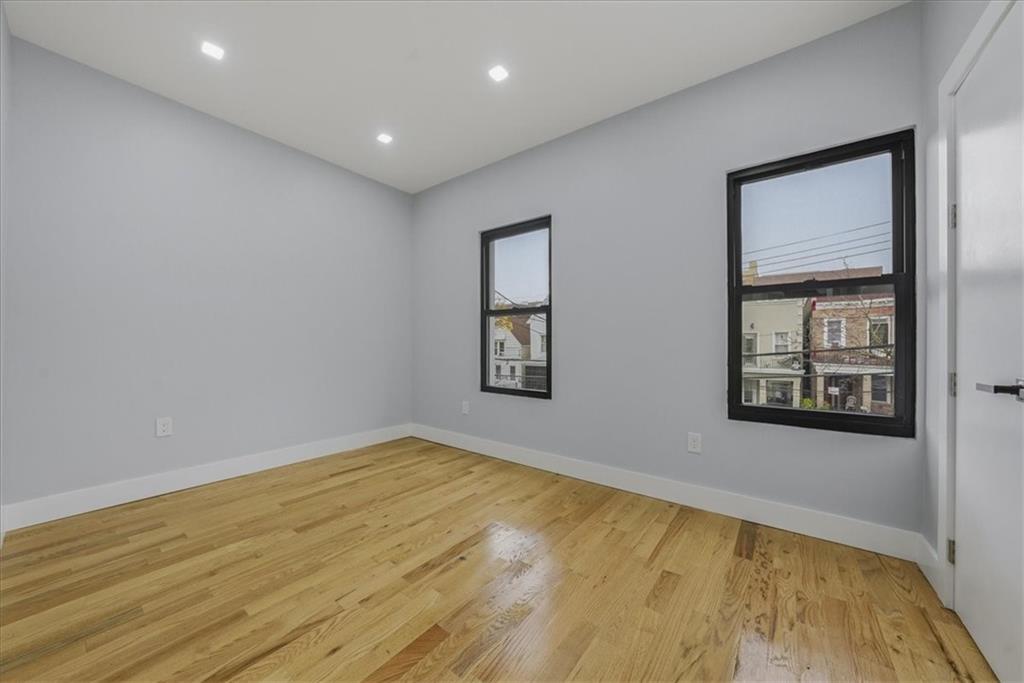 2862 Briggs Avenue Bronx, NY 10458 - Photo 24 of 38 a view of empty room with windows