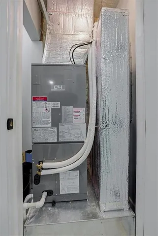 a bathroom with a tub and shower