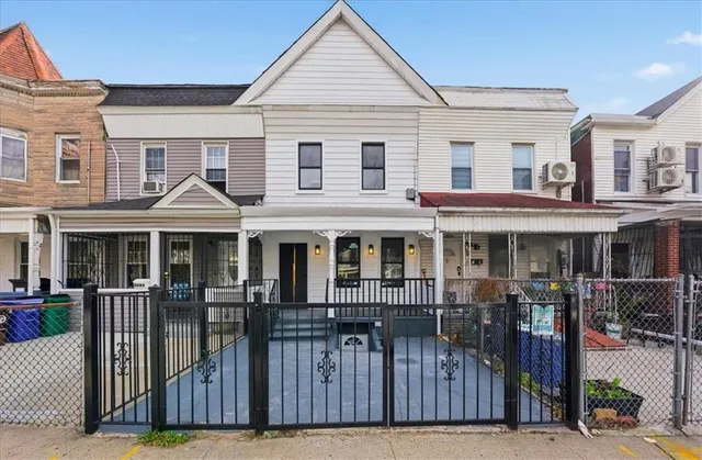 a front view of a house with a porch